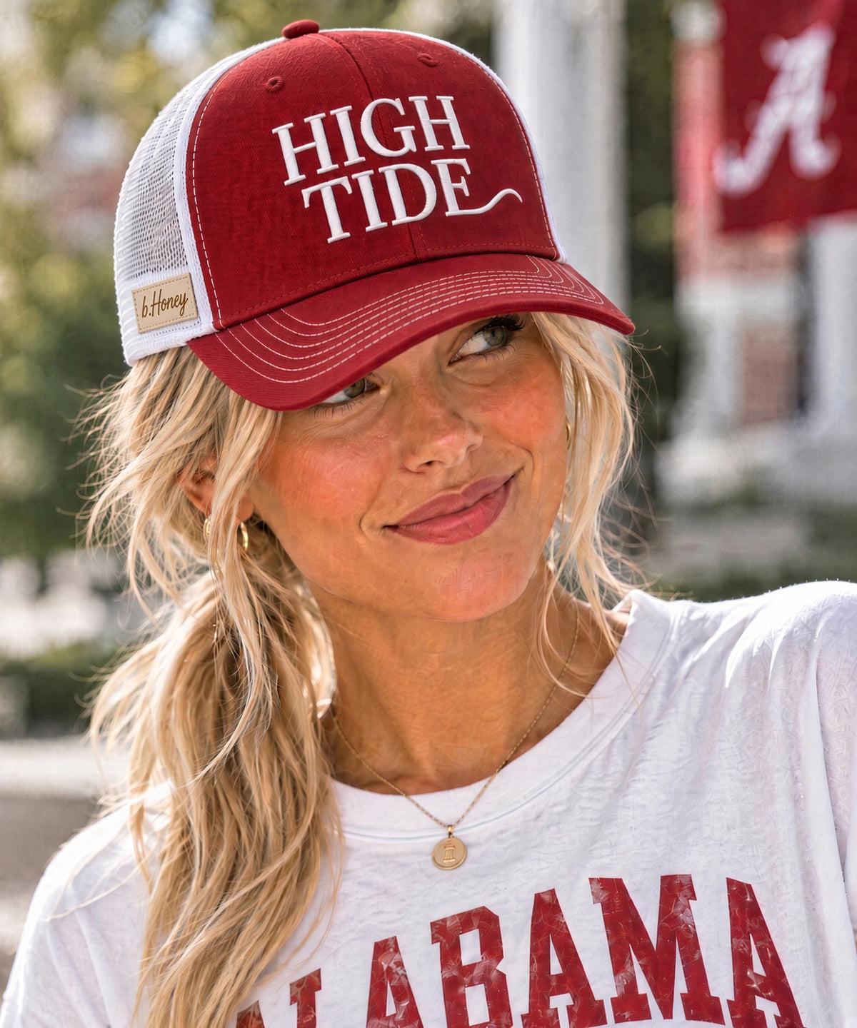 Honey Lid: University of Alabama — crimson and white Richardson 115 trucker with raised white High Tide embroidery, worn on model