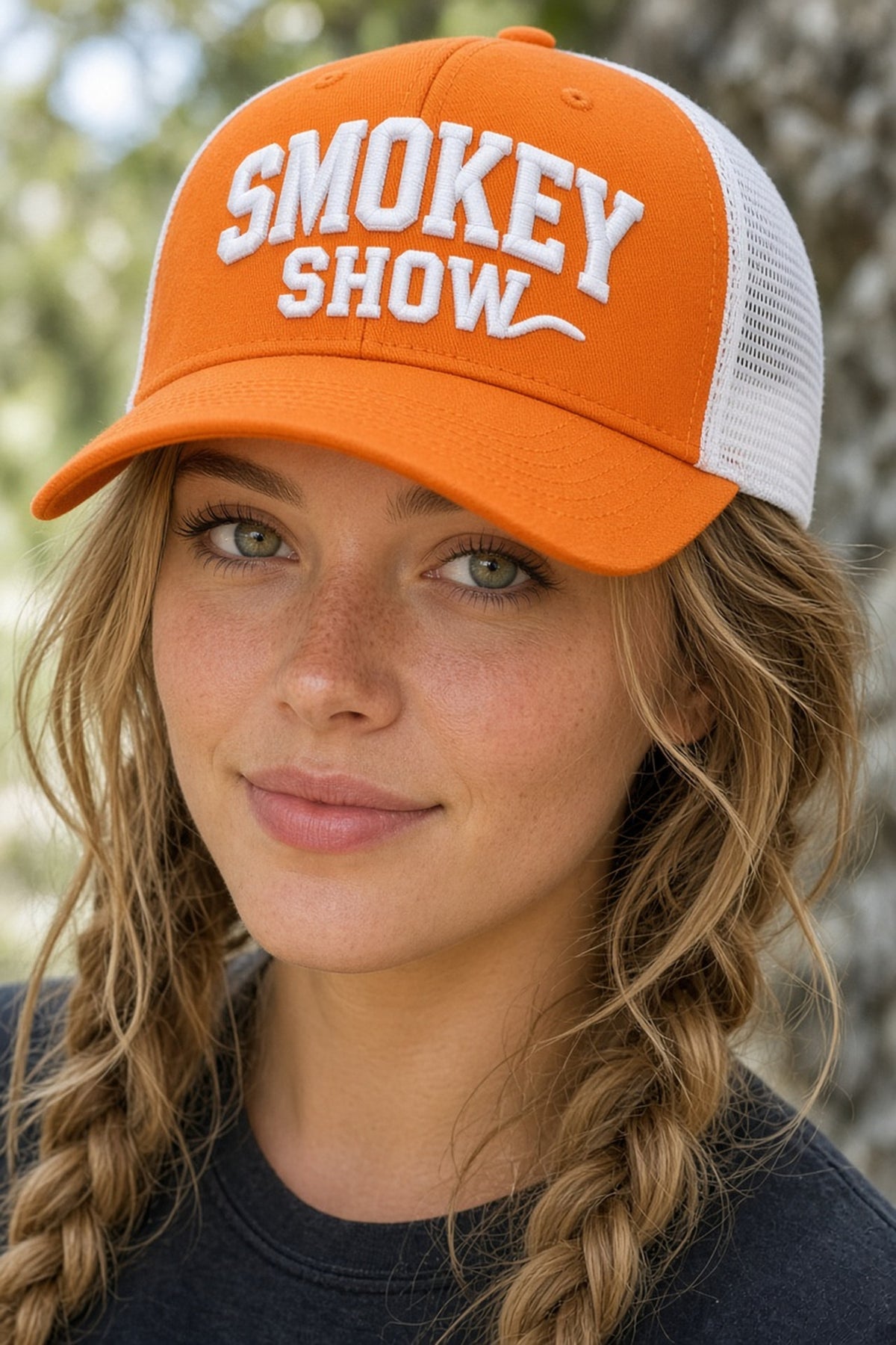 Honey Lid: University of Tennessee — orange Richardson 115 trucker with raised white Smokey Show embroidery, on model