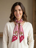 Model wearing the b.Honey Ribbon: University of Alabama tied at the neck