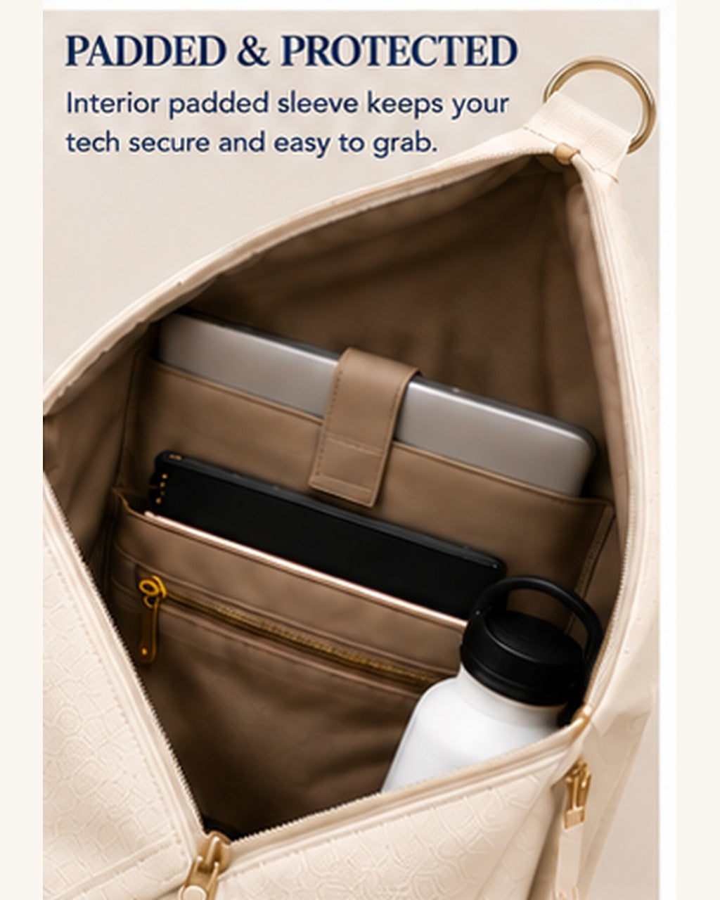 Interior padded sleeve of the Michigan Honey Sling holding a laptop, tablet and water bottle