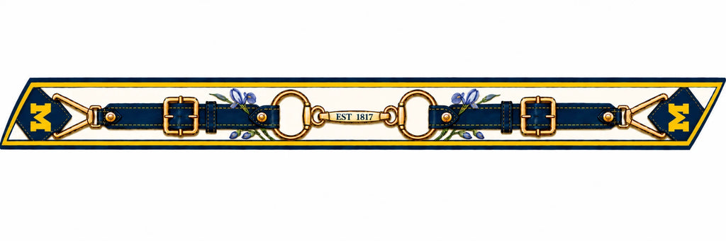 Honey Ribbon: University of Michigan flat artwork — cream ground, navy straps, gold buckles, EST 1817 bit and gold block M ends
