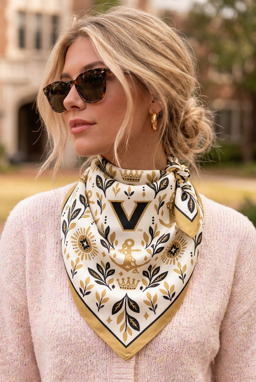 Model wearing the b.Honey Square: Vanderbilt University tied at the neck