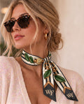 Model wearing the b.Honey Ribbon: Wake Forest University at the neck