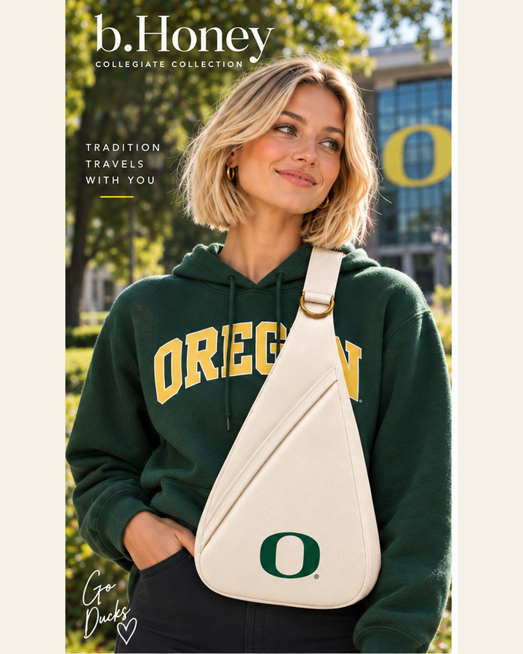 Model on the University of Oregon campus wearing the cream Honey Sling with green O mark and gold hardware