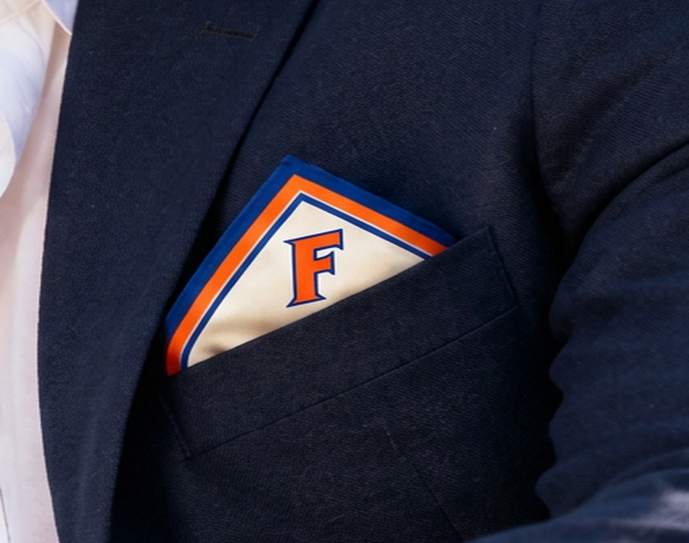 Florida Honey Pocket folded in a navy jacket breast pocket