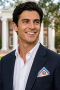 Man in a navy blazer wearing the Ole Miss b.Honey Pocket in a point fold