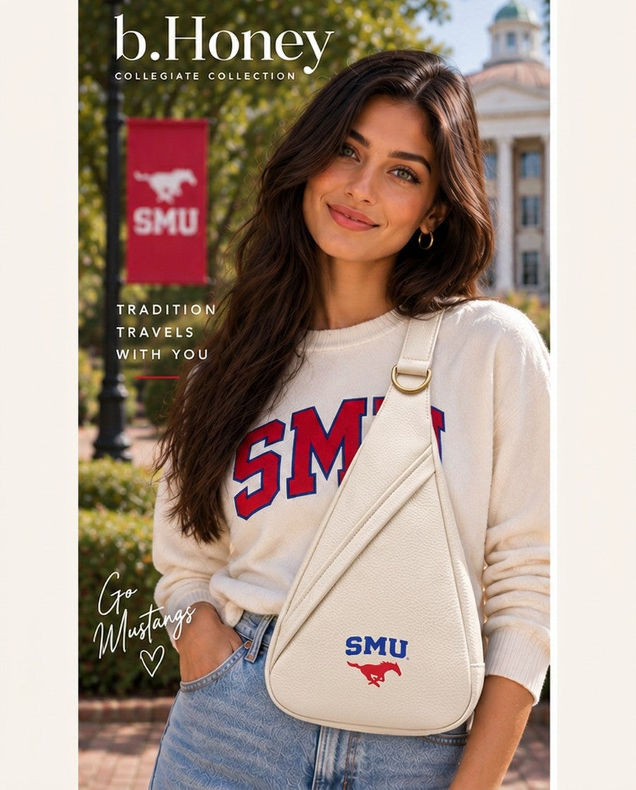 Model on the SMU campus wearing the ivory b.Honey Honey Sling with the blue SMU wordmark and red Mustang