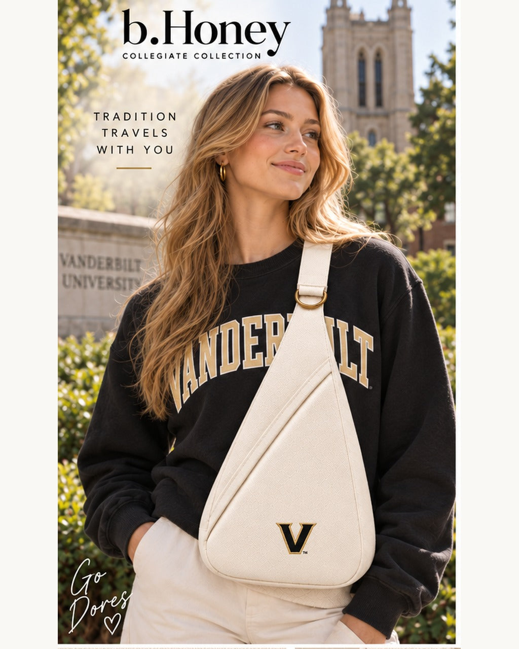 Campus model wearing the cream Vanderbilt Honey Sling with black-and-gold V mark and gold hardware